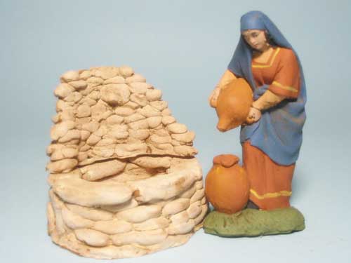 Donna con orci alla fontana