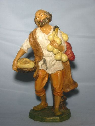 Pastore con pane e caciotte