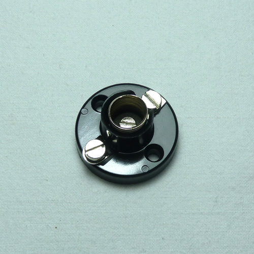 Portalampada micromignon E 10, con base in bachelite.